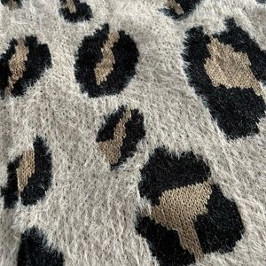 Woman’s XL animal print sweater never worn